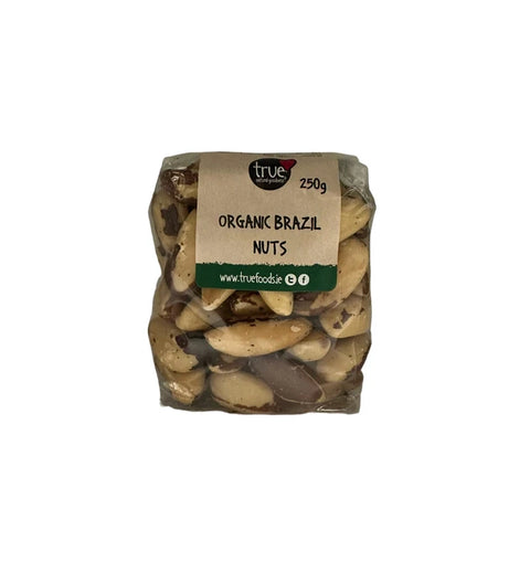 Bag of organic Brazil nuts with a visible brand label on a white background