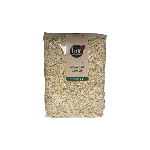 Bag of organic jumbo oatflakes with 'true' brand label on a white background